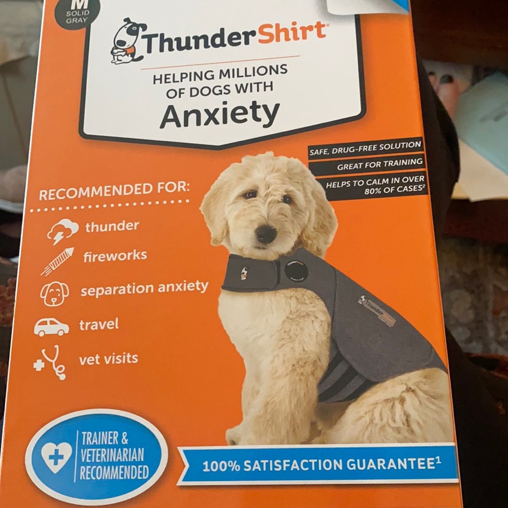 Brand new Thundershirt for dogs, size M.